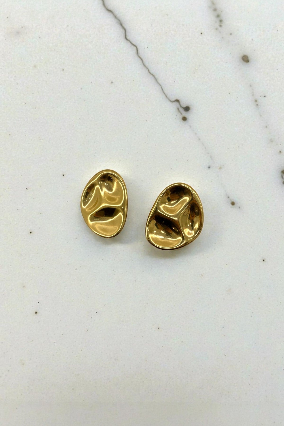 Boucle d’oreille or frappé